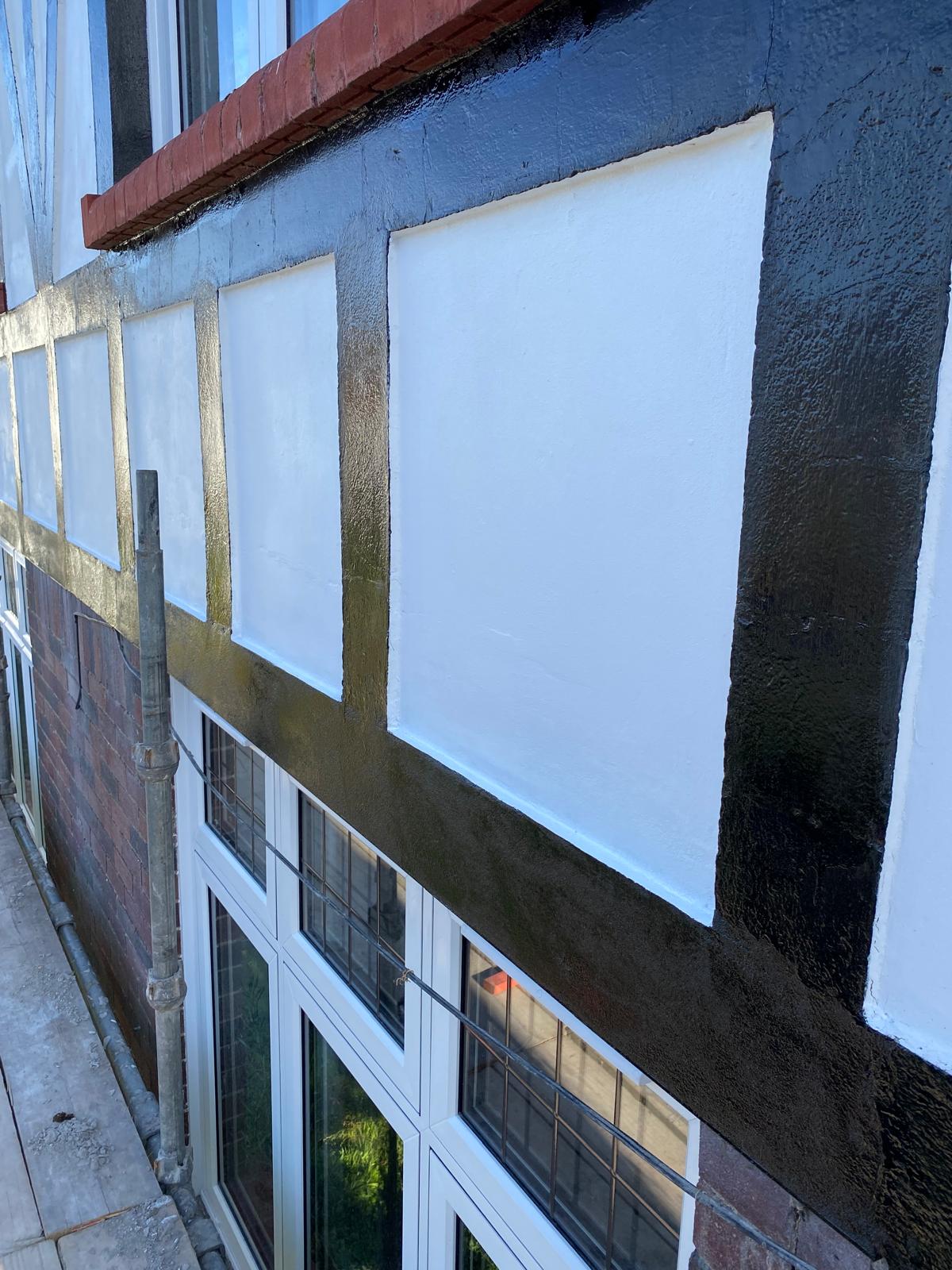 Exterior timber framing repainted